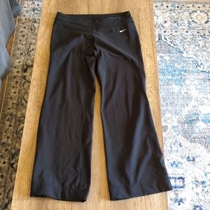 Women's Nike dry fit athletic material size medium wide leg. Barely worn.